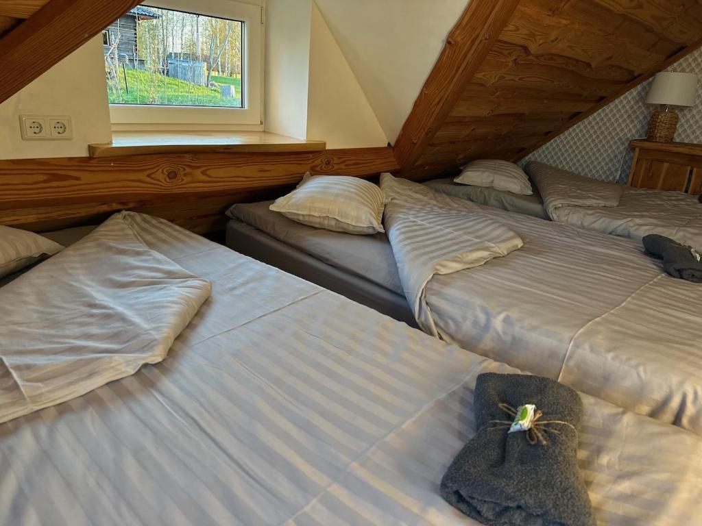 Postel nebo postele na pokoji v ubytování Kaldavere Tourism Farm