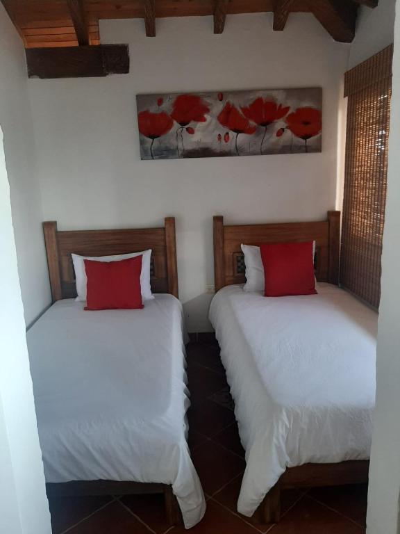 Postel nebo postele na pokoji v ubytování Hotel Zocalo Campestre