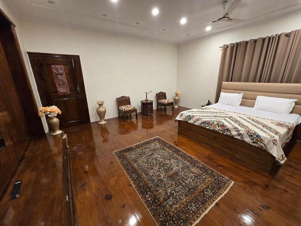 Postel nebo postele na pokoji v ubytování Taha Inn Home comfort