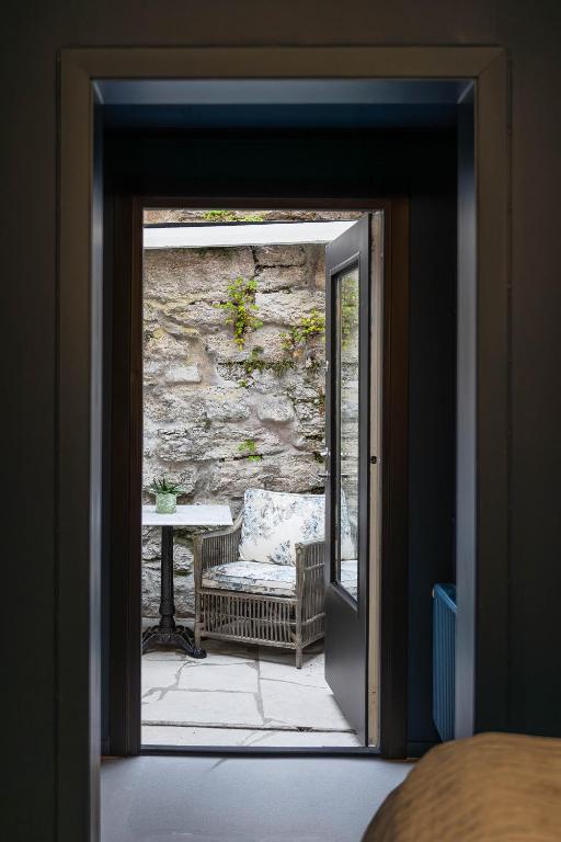 Posezení v ubytování Villa Gutebagge Hotell