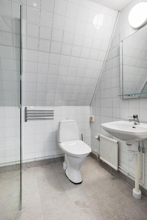 Koupelna v ubytování Villa Gutebagge Hotell