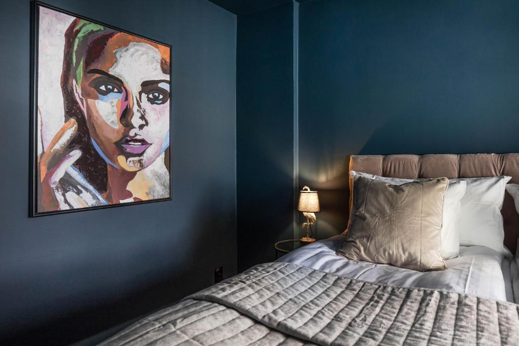 Postel nebo postele na pokoji v ubytování Villa Gutebagge Hotell