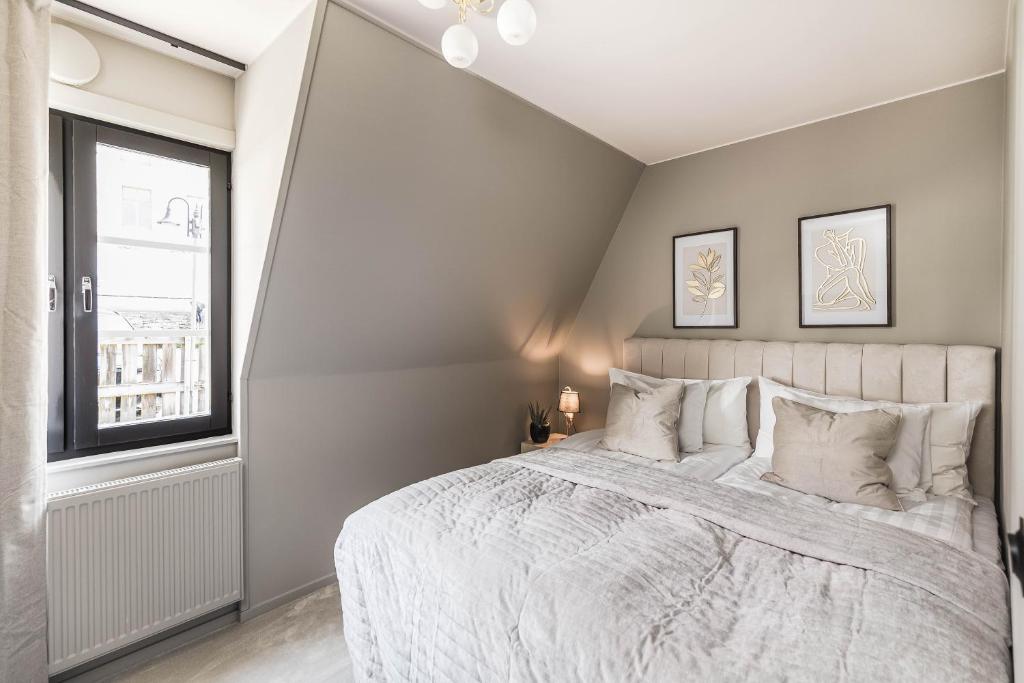 Postel nebo postele na pokoji v ubytování Villa Gutebagge Hotell