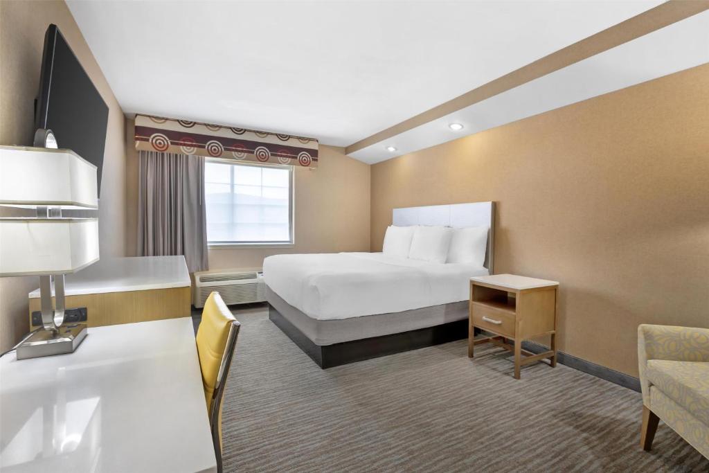 Postel nebo postele na pokoji v ubytování Best Western Cooperstown