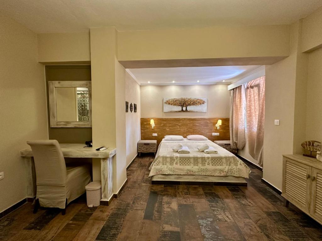 Postel nebo postele na pokoji v ubytování Agrili Apartments & Rooms