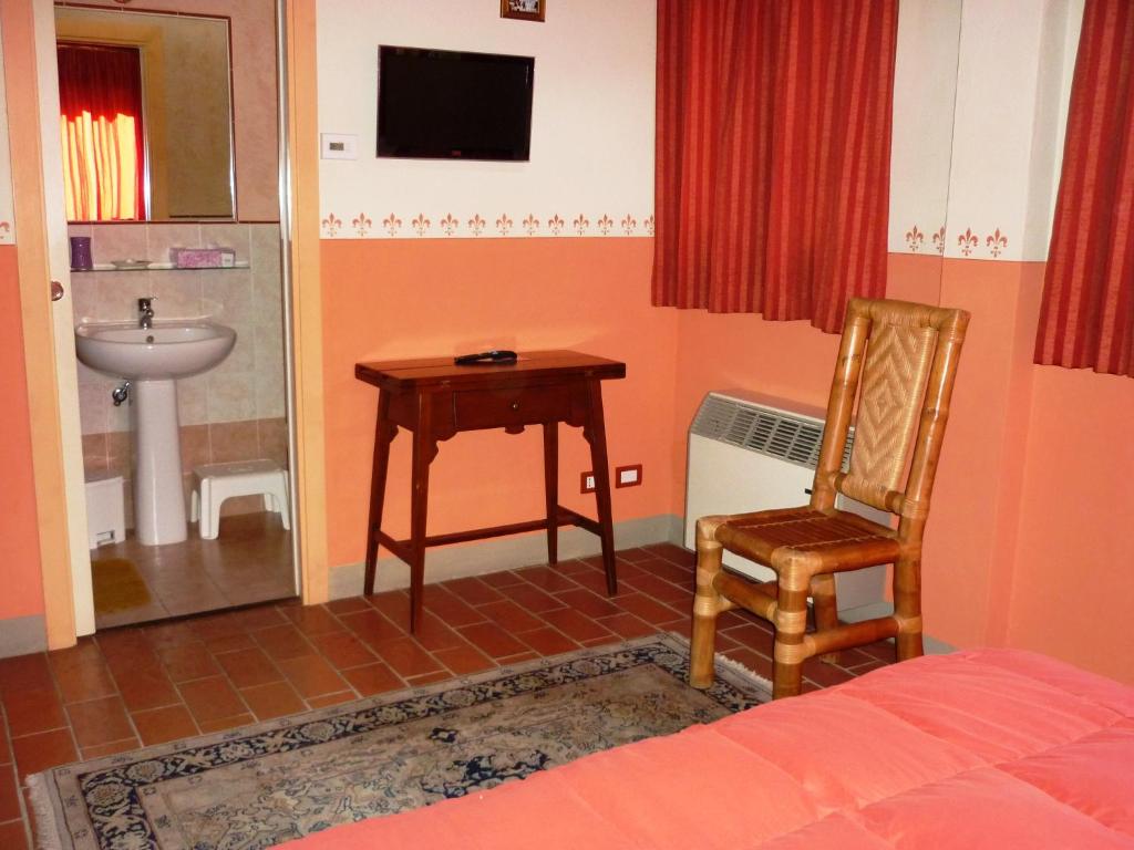 TV a/nebo společenská místnost v ubytování B&B Casale Ginette