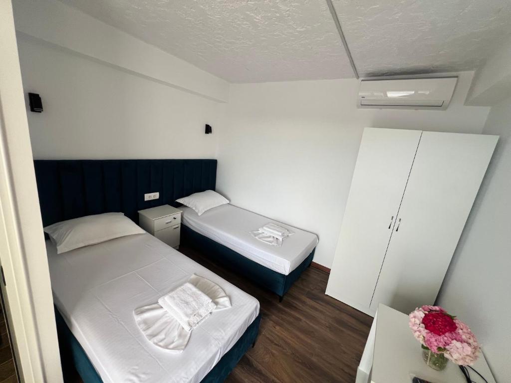 Postel nebo postele na pokoji v ubytování Iart Residence