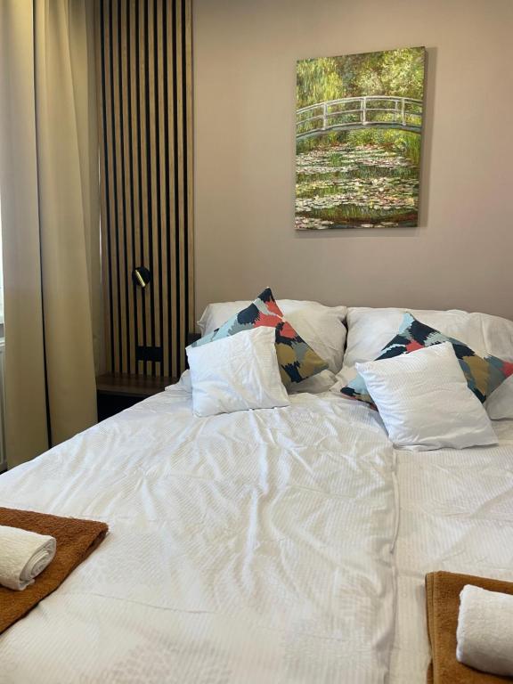 Postel nebo postele na pokoji v ubytování Apartmánový dom Ametyst