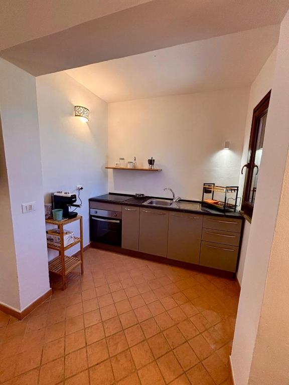 Kuchyň nebo kuchyňský kout v ubytování Ciuri di Pantelleria Dammusi
