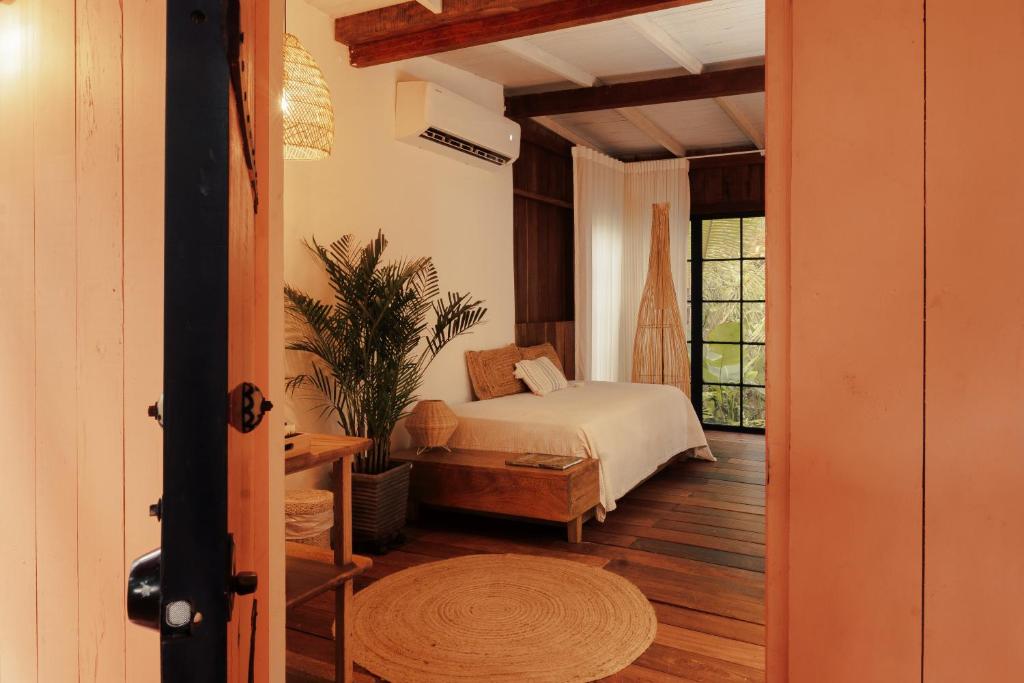 Postel nebo postele na pokoji v ubytování Solea Villa Tropical