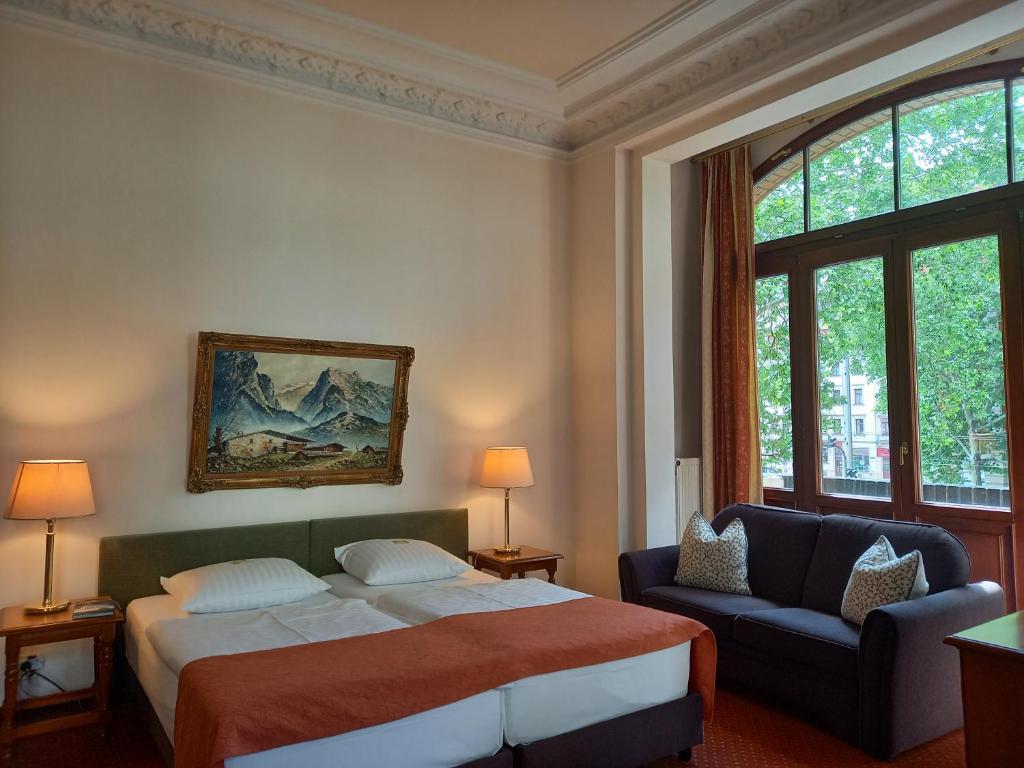 Postel nebo postele na pokoji v ubytování Hotel Artushof