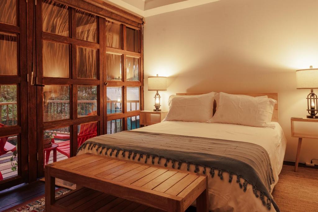 Postel nebo postele na pokoji v ubytování Solea Villa Tropical