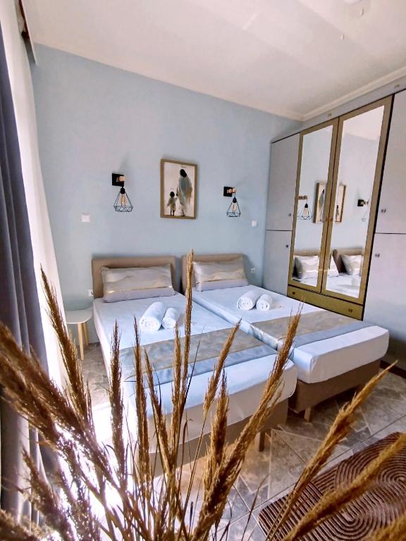 Ein Bett oder Betten in einem Zimmer der Unterkunft Sunrise Suite
