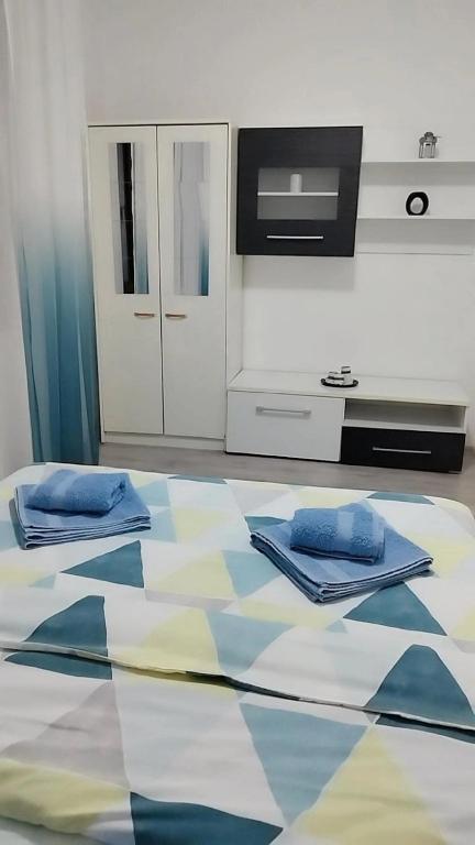 Postel nebo postele na pokoji v ubytování SAMI APARTMAN