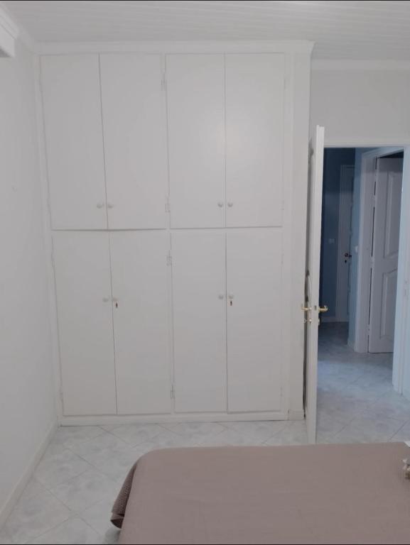 Postel nebo postele na pokoji v ubytování Dennis House