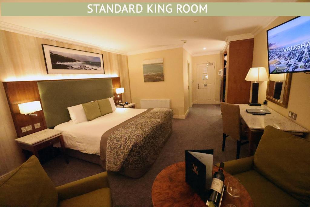Voodi või voodid majutusasutuse Vaughan Lodge Hotel toas