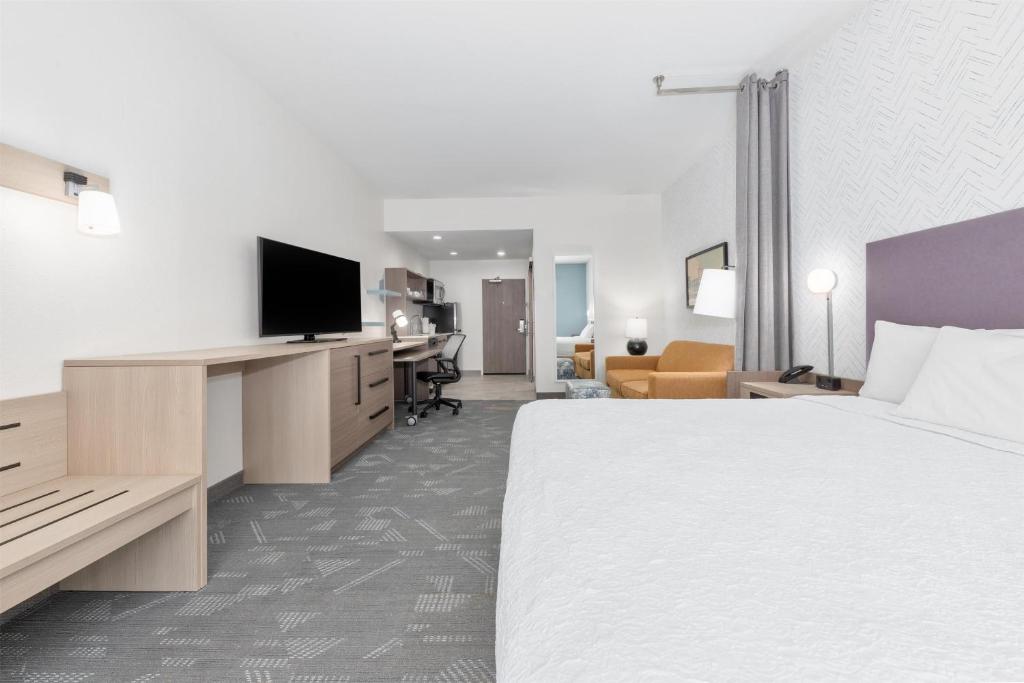 Postel nebo postele na pokoji v ubytování Home2 Suites By Hilton Paris