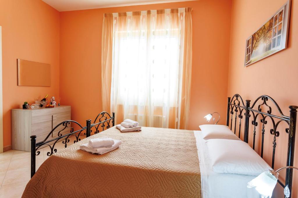 Postel nebo postele na pokoji v ubytování Petra Leccese - Art & Luxury Design B&B with Pool