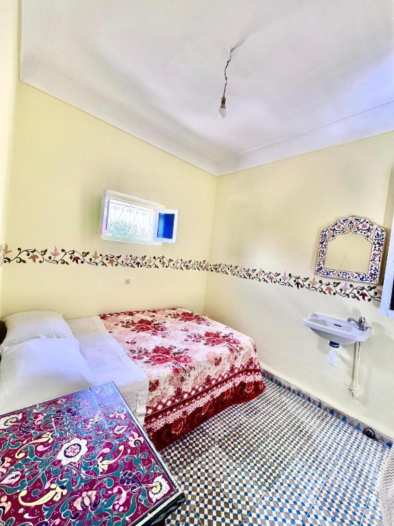 Postel nebo postele na pokoji v ubytování Hotel Medina