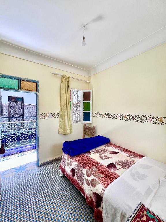 Postel nebo postele na pokoji v ubytování Hotel Medina