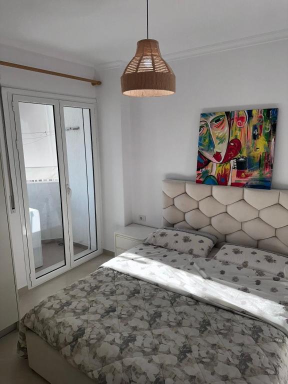 Postel nebo postele na pokoji v ubytování Apartment near Lungo Mare beach