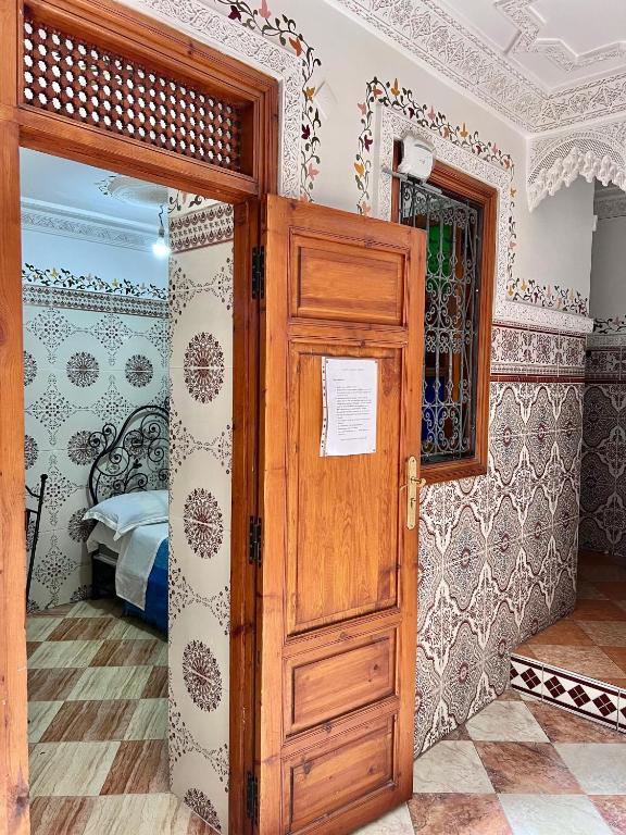 Postel nebo postele na pokoji v ubytování Hotel Medina