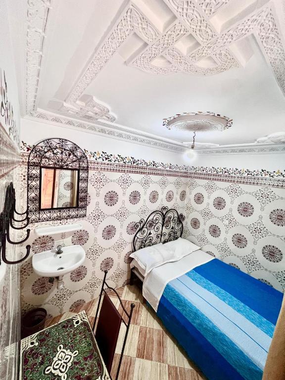 Postel nebo postele na pokoji v ubytování Hotel Medina