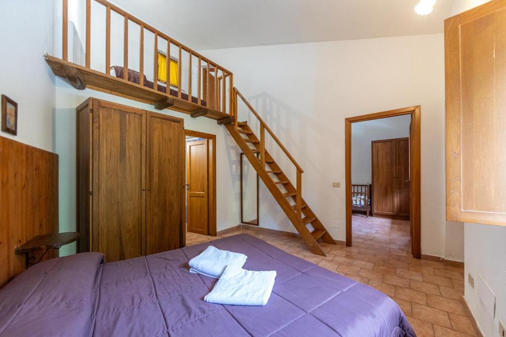 Postel nebo postele na pokoji v ubytování Agriturismo La Ferrera