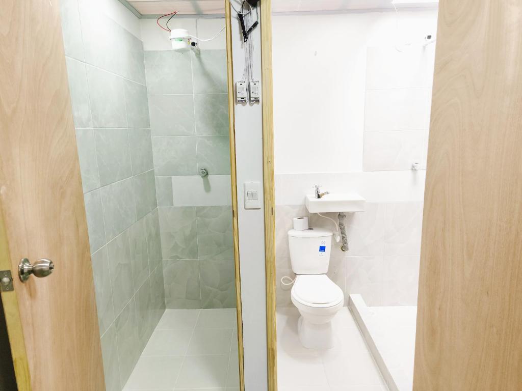Koupelna v ubytování Kuyay Yachi Hostel