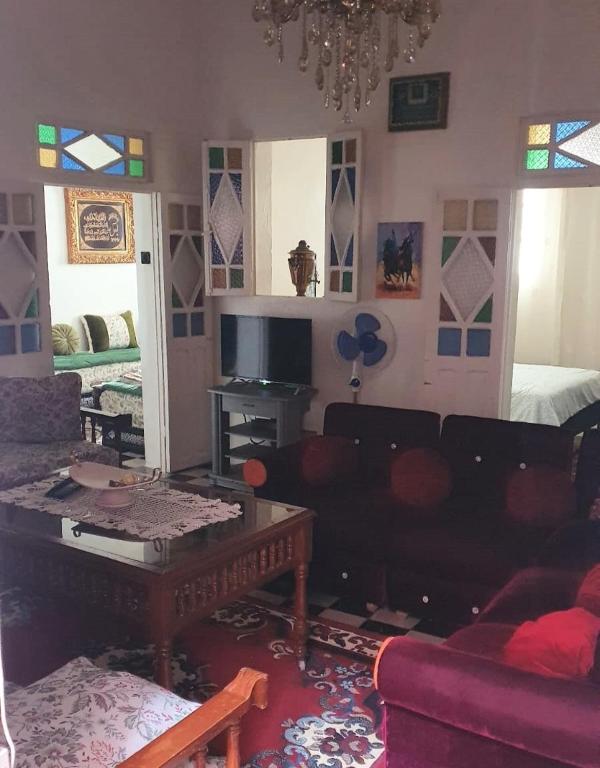 TV a/nebo společenská místnost v ubytování Maison Familiale, vue sur mer à 5 minutes