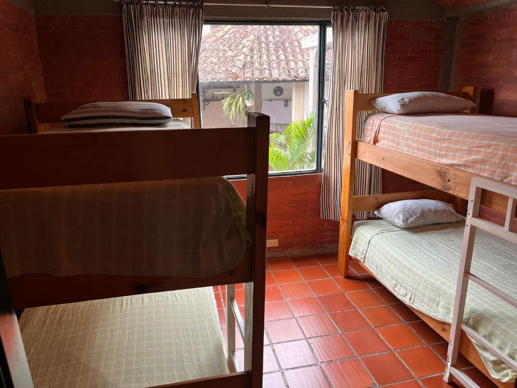 Postel nebo postele na pokoji v ubytování Hotel Aguablanca
