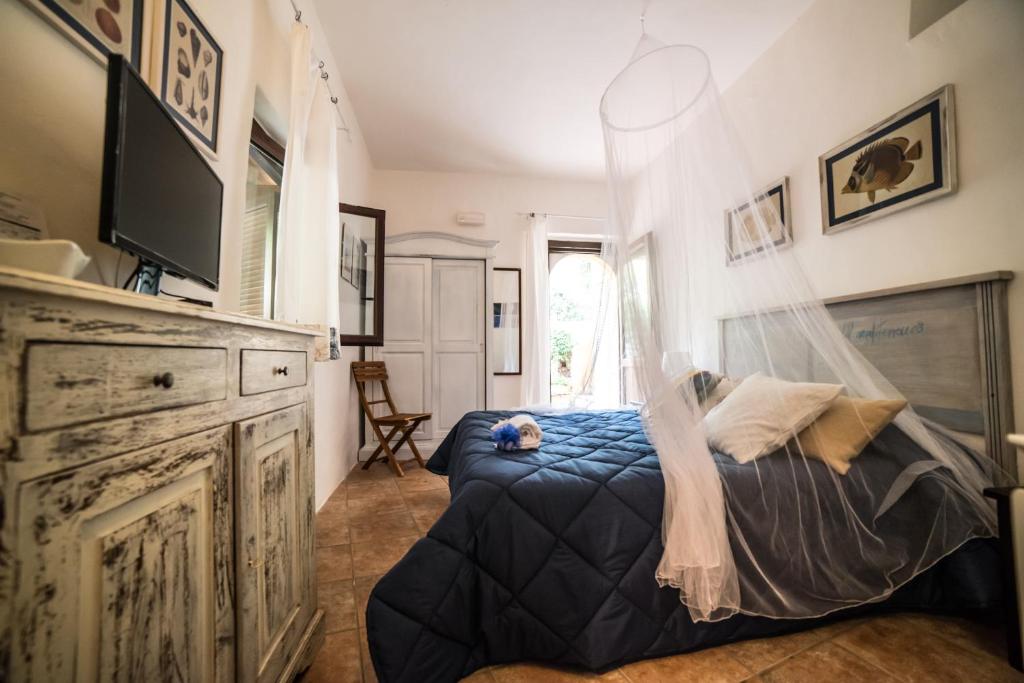 Postel nebo postele na pokoji v ubytování B&B Calandrella
