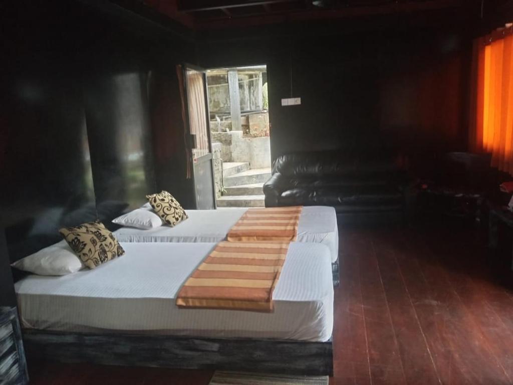 Postel nebo postele na pokoji v ubytování Ella Deck Villa