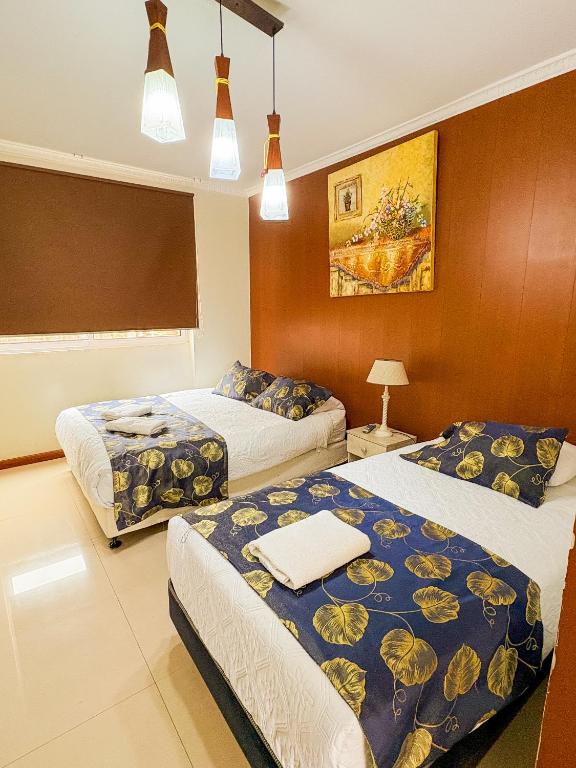 Postel nebo postele na pokoji v ubytování Hotel Divasto