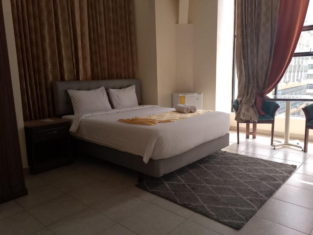 Postel nebo postele na pokoji v ubytování Hotel Las Peñas