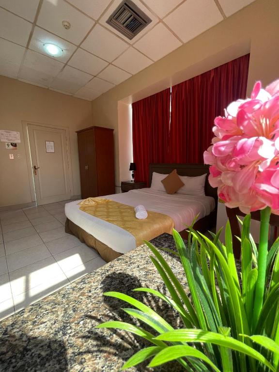 Postel nebo postele na pokoji v ubytování Hotel Las Peñas