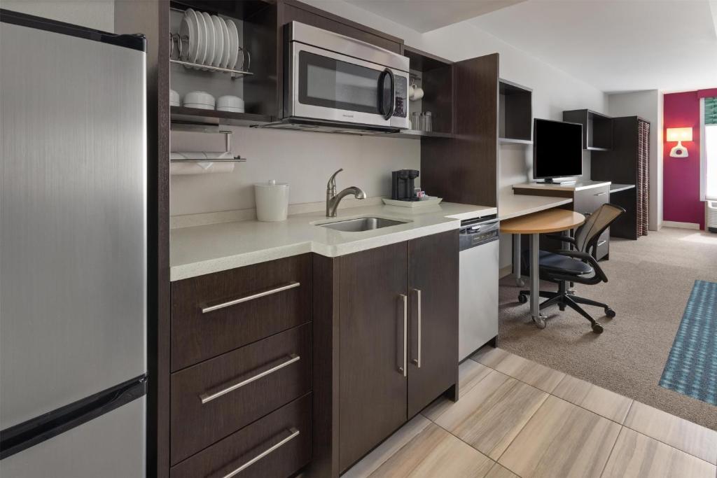 Kuchyň nebo kuchyňský kout v ubytování Home2 Suites Dover