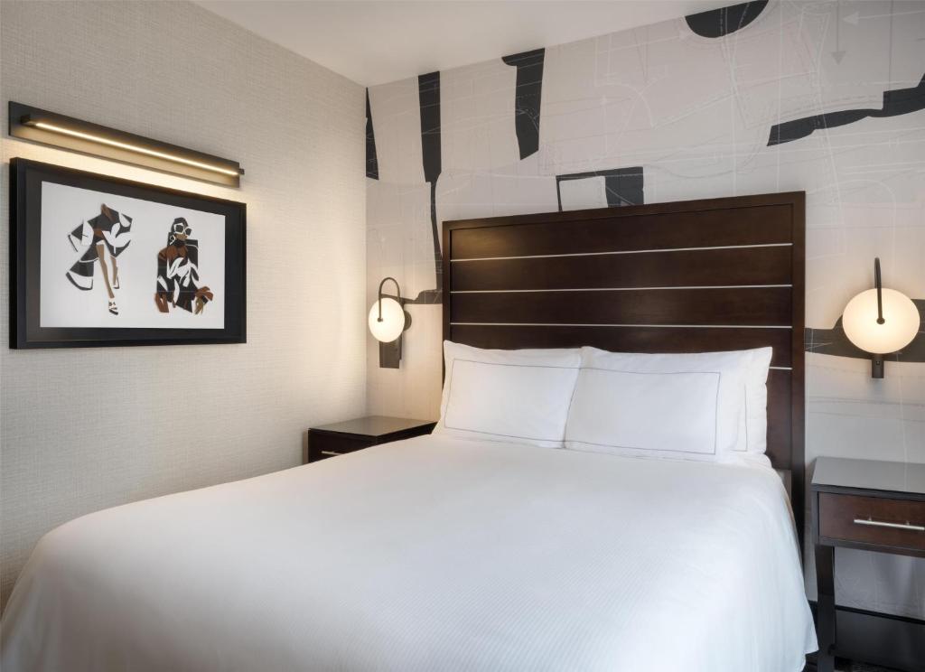 Cama ou camas em um quarto em Hilton New York Fashion District