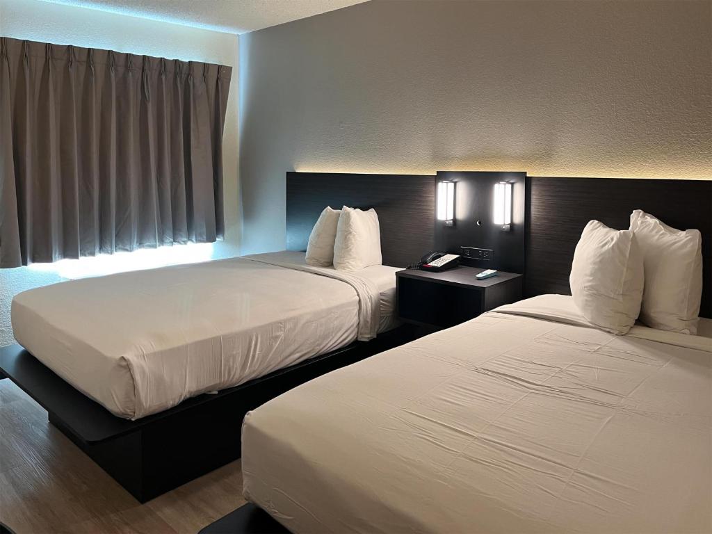 Ένα ή περισσότερα κρεβάτια σε δωμάτιο στο Motel 6 Las Vegas, NV - Strip