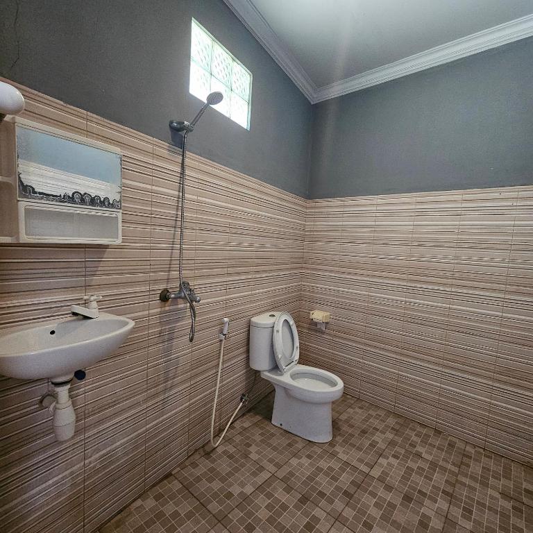 Koupelna v ubytování Ridho Malik Hotel