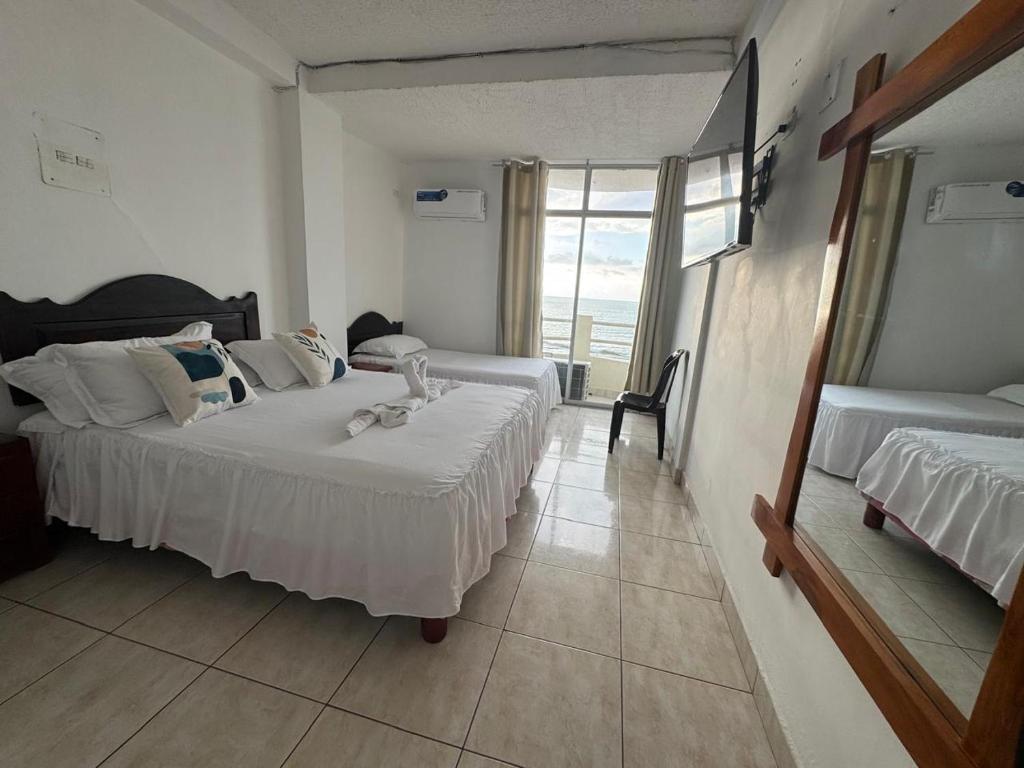 Postel nebo postele na pokoji v ubytování HOTEL PAL-MAR
