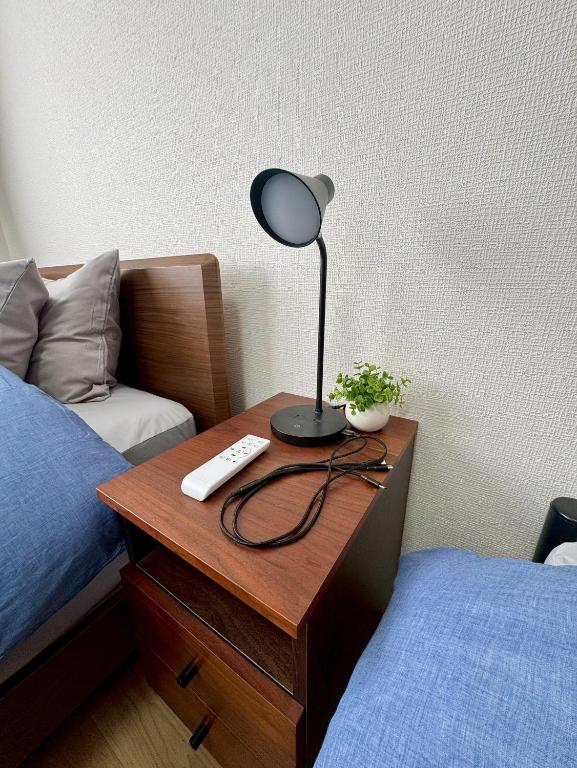 Postel nebo postele na pokoji v ubytování Stay ABASHIRI BAY