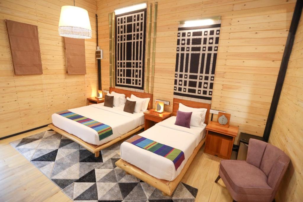 Postel nebo postele na pokoji v ubytování The Feel Luxury Boutique Hotel Ella