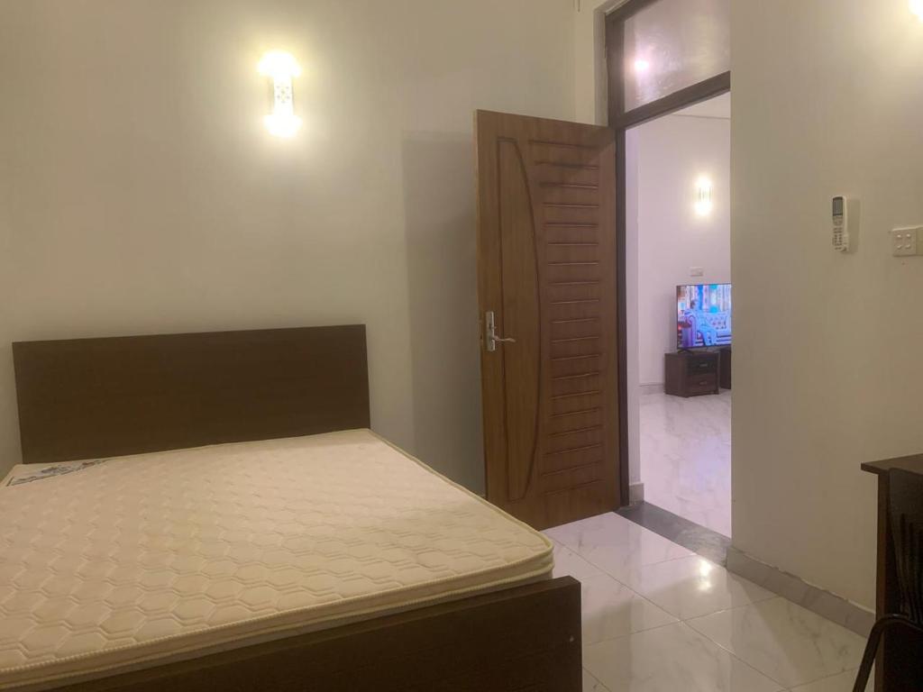 Postel nebo postele na pokoji v ubytování Homestay