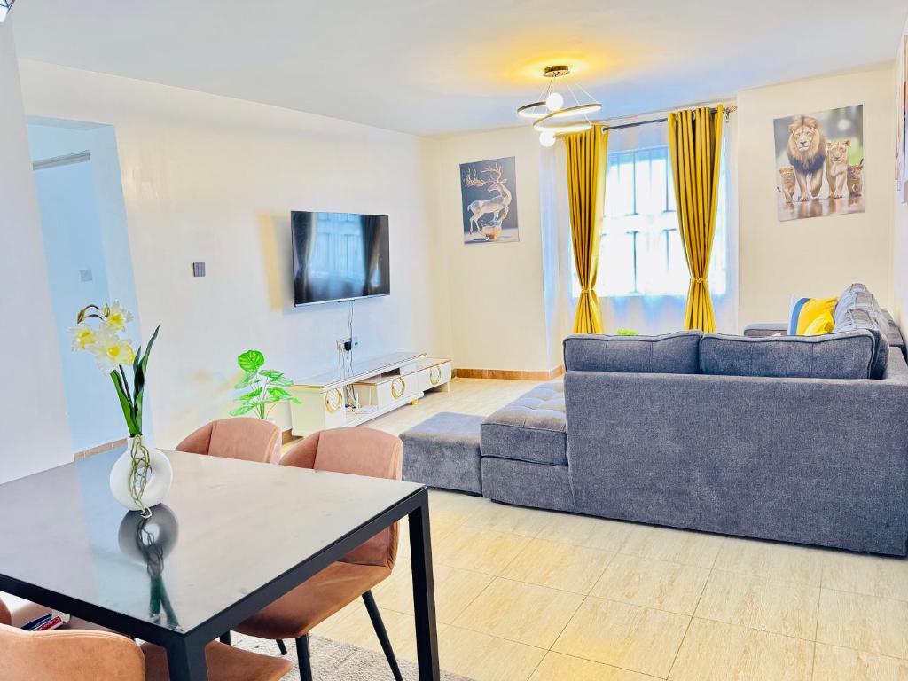 TV a/nebo společenská místnost v ubytování Serene Escapade