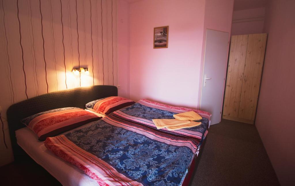 Posteľ alebo postele v izbe v ubytovaní B.ADEN Pension