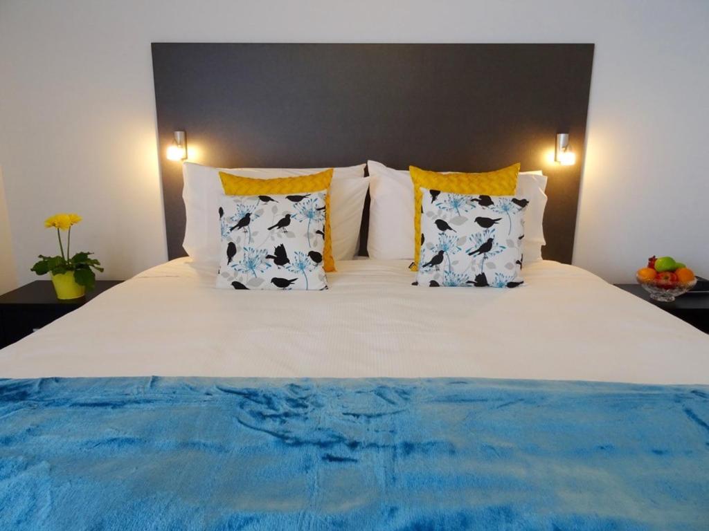 Postel nebo postele na pokoji v ubytování BKs Premier Motel Hamilton