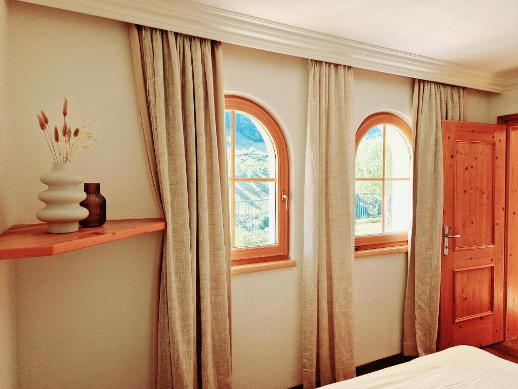 A bed or beds in a room at Appartementhaus Unterkofler