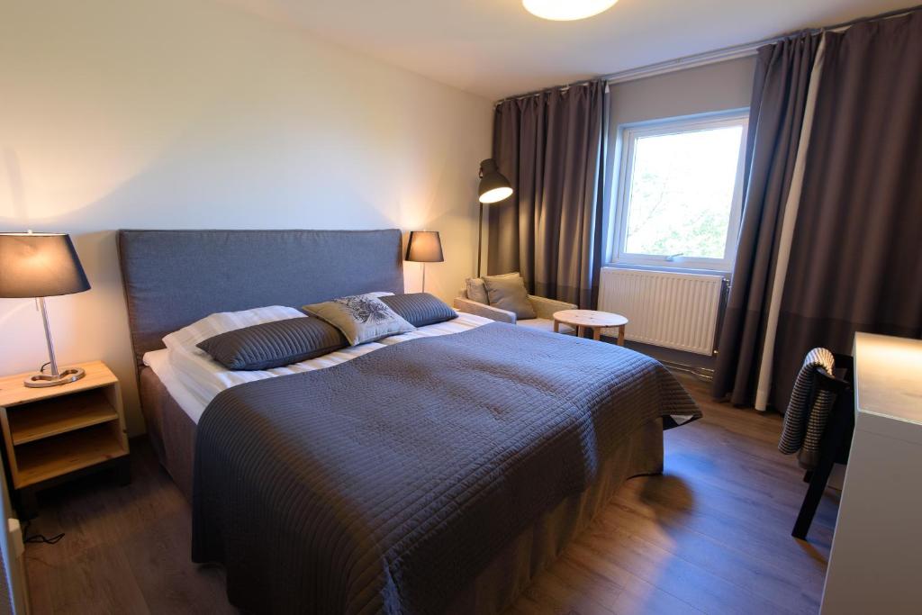 Postel nebo postele na pokoji v ubytování Hornavan Hotell