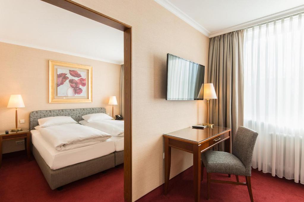 Postel nebo postele na pokoji v ubytování Best Western Plus Hotel St. Raphael